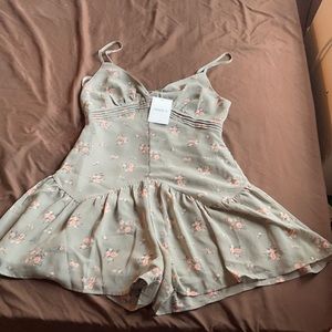 Selling this jumpsuit, size medium